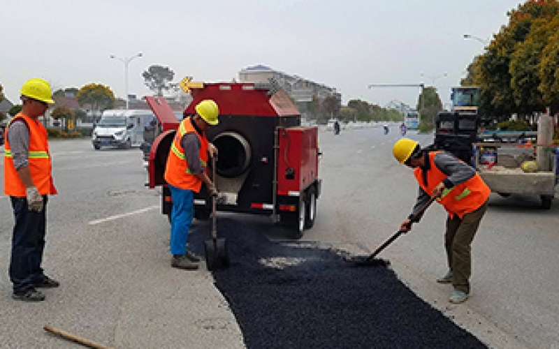 Routine road maintenance in autumn